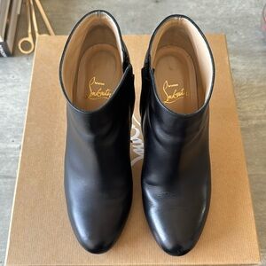 Authentic Christian Louboutin Belle black leather ankle with size zipper.